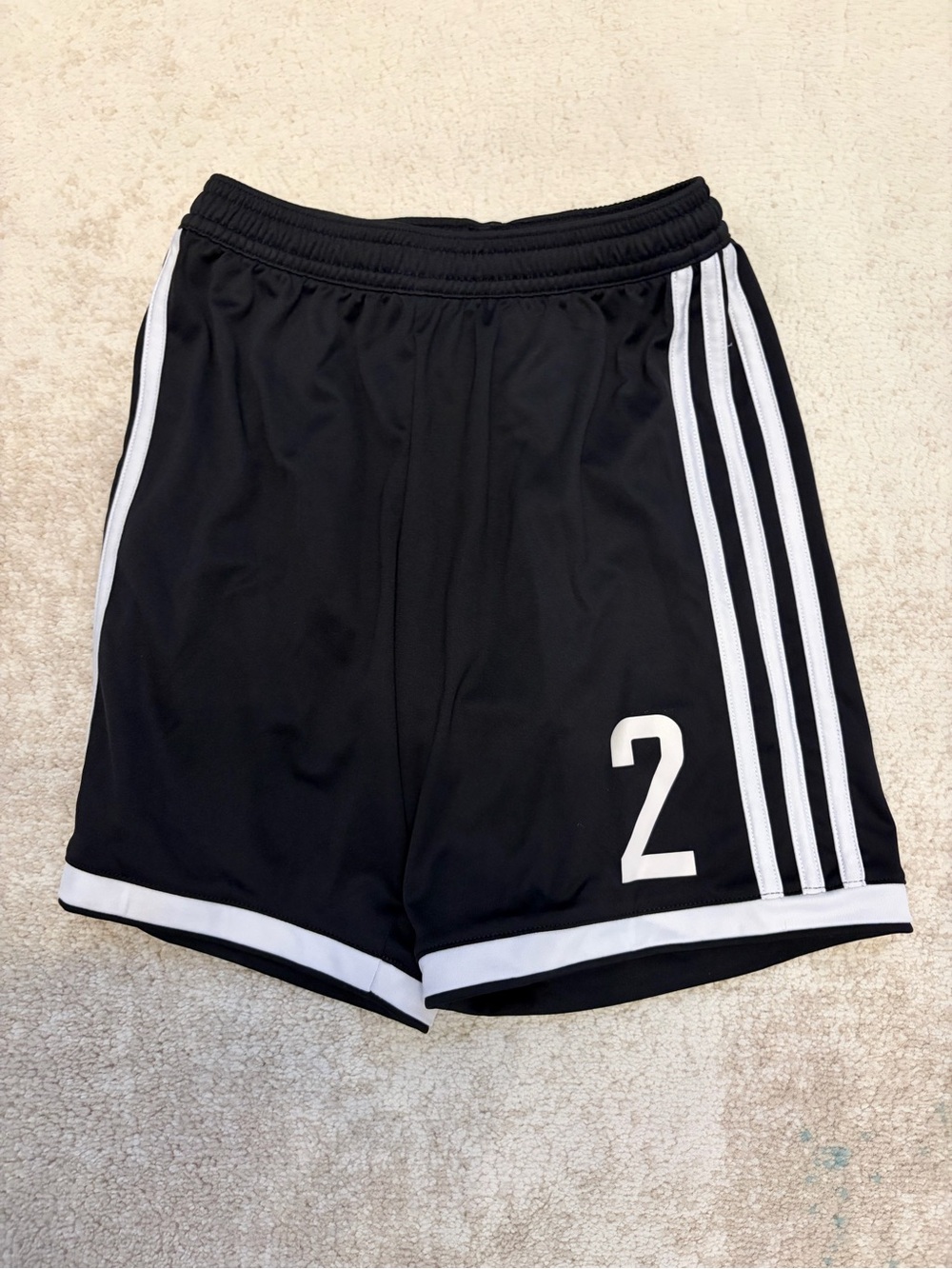 Black adidas kids shorts with White Trim and Number 2